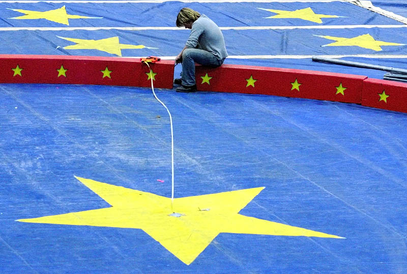 Tommy Liebel plugs together sections of lighted circus ring on Thursday at the Augusta Civic Center. There will be two rings set up for the annual Kora Temple Shrine Circus this weekend. Shows are at 2 and 7 p.m. on Friday and 9:30 a.m., 2 and 7 p.m. on Saturday.