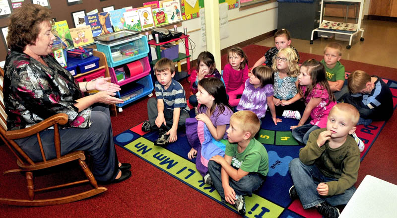 (FILE) Solon Elementary School Principal Jean Butler with kindergarten students.