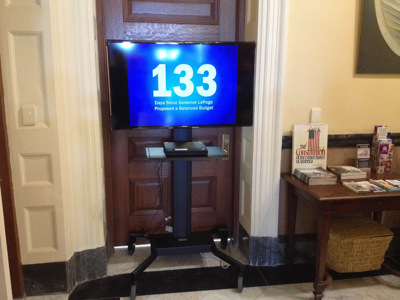 Gov. Paul LePage installed a flat-screen television outside his office in the Hall of Flags. He says he'll move out of the State House because he Legislature, which controls that area, told him to remove it or at least follow proper procedure and request permission to have it.