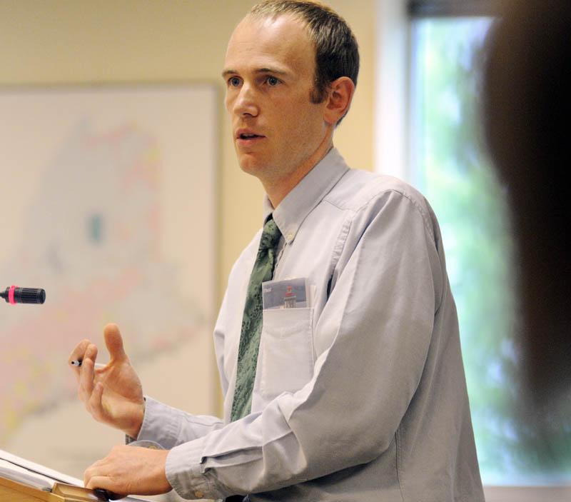 Carrabec High School math teacher Marc Collard discusses a proposal to evaluate teachers Tuesday during a hearing before the Education and Cultural Affairs Committee.