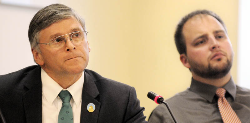 Sen. Chris Johnson, D-Somerville, left, and Rep. Matthew G. Pouliot, R-Augusta, listen to proponents of legislation to evaluate teachers Tuesday, during a hearing before the Education and Cultural Affairs Committee.