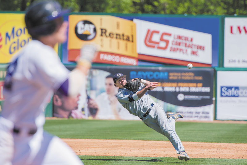 ON THE RUN: University of Southern Maine shortstop Sam Dexter makes a throw to first during fifth inning of the Huskies’s 2-1 win over Millsap in the first-round of the Division III College World Series at Time Warner Cable Field in Appleton, Wis. Division Three Baseball Tournam University of Southern Maine