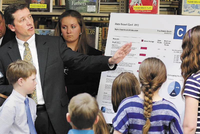 Education Commissioner Stephen Bowen unveiled the state's new A-F grading system on Wednesday May 1, 2013 at the Maine State Library. Gov. Paul LePage said the grades would make schools accountable.