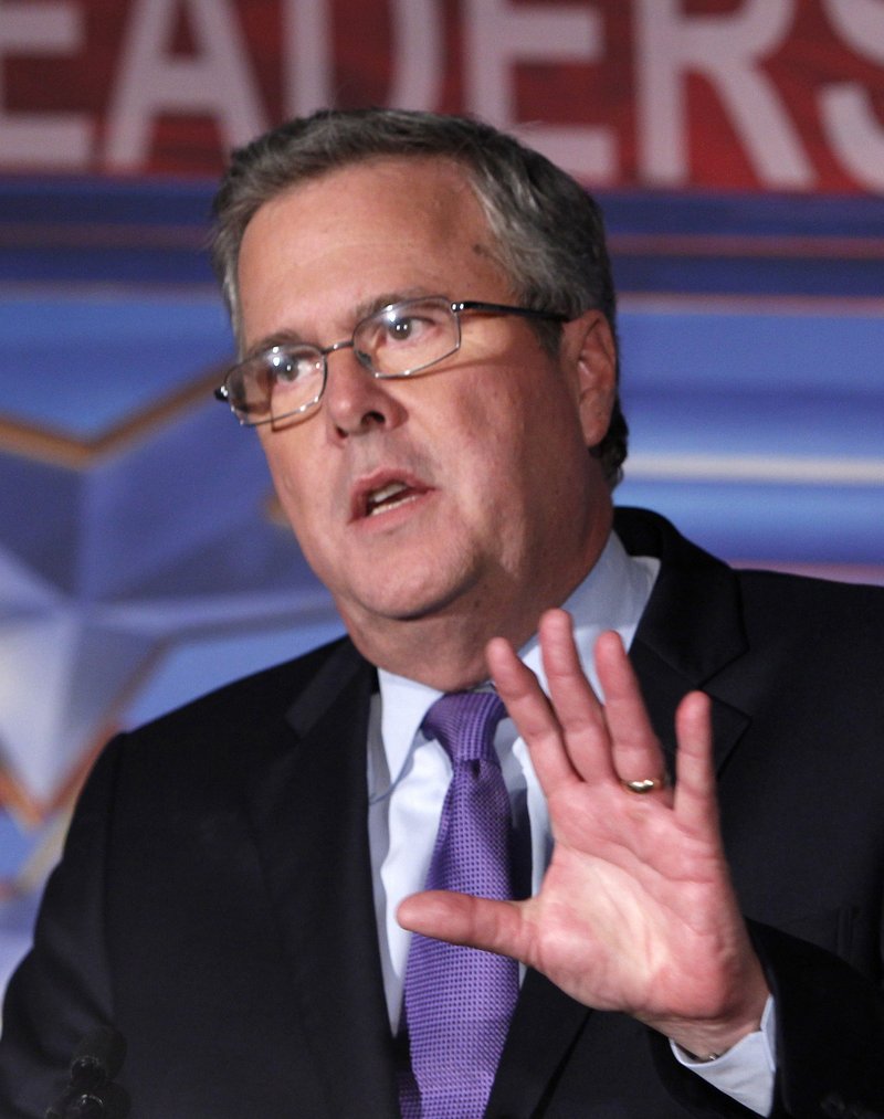 In this Jan. 26, 2012 file photo, former Florida Gov. Jeb Bush speaks in Miami. Bush will headline a re-election campaign event for Maine Gov. Paul LePage next month. (AP Photo/Wilfredo Lee, File)