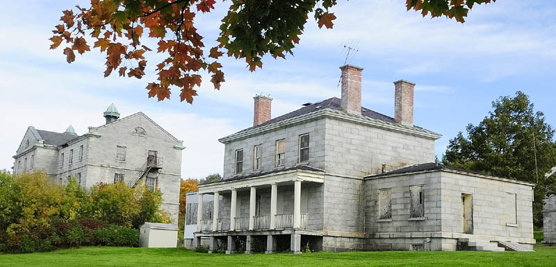 The doors and windows of several buildings at the Kennebec Arsenal have been boarded up.