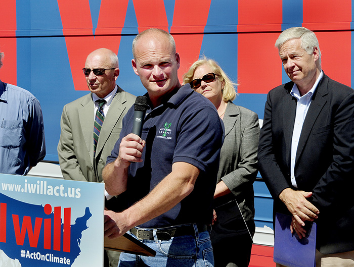 Lobsterman Jim Merryman, owner of Potts Harbor Lobster Co., speaks at the "I Will Act On Climate" bus tour Monday in Portland's Monument Square. Other speakers included Portland Mayor Michael Brennan, U.S. Rep. Chellie Pingree, D-1st District, and U.S. Rep. Michael Michaud, D-2nd District, standing in background.