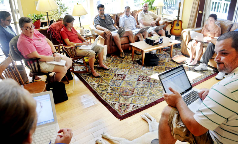 Regional School Unit 12 administrators set goals Monday for the coming school year, during a retreat at an employee's Monmouth home.