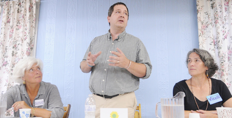 Green Party Senate District 19 candidate Daniel Stromgren addresses guests to the forum held Wednesday at the Enterprise Grange in Richmond. Stromgren, Republican candidate Paula Benoit, left, and Democrat Eloise Vitelli each spoke to the crowd.