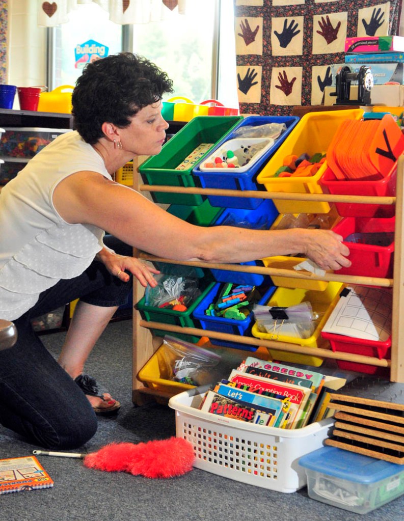 Kindergarten teacher Nancy Stover organizes her classroom on Aug. 20 at Dresden Elementary School.