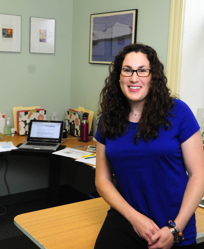 Katie Joseph, the new curriculum director for Regional School Unit 11, poses in her office today.