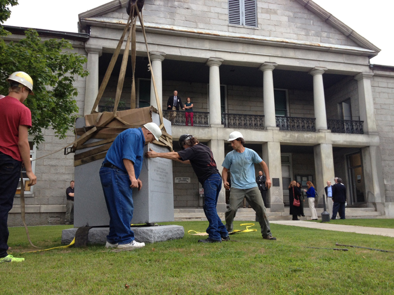 Crews from Masciadri Monuments and W.H. Green set a memorial for U.S. Chief Justice Melville Weston Fuller this morning in front of the Kennebec County Superior Court in Augusta. The Augusta native presided over the top court of the land from 1888-1910.