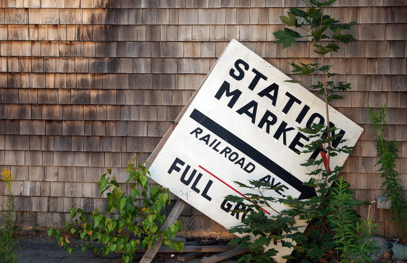 Signs on Route 11 point to the business district on Railroad Avenue at Brownville Junction. But the businesses on the road have all gone. The Station Market, a grocery store, closed about three years ago.