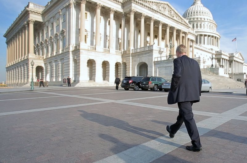 Sen. Angus King arrives at the Capitol on a spring morning. King says Senate leaders have respected his independence.