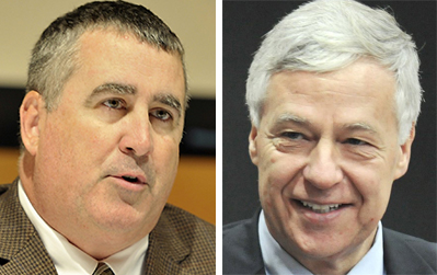 Steve Woods, left, declared his "unequivocal support" for Mike Michaud, right, at a news conference in Falmouth on Wednesday.