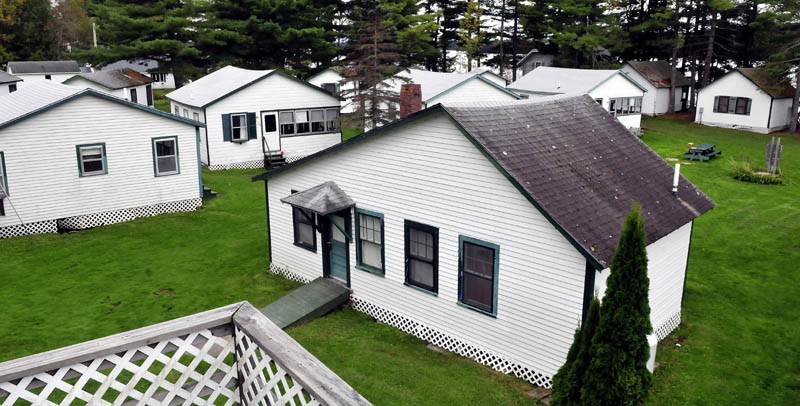 Some of the cottages at The Cabins property on China Lake in China. Voters will decide whether to purchase the 9-acre property on the lake that could become the China Community Park.