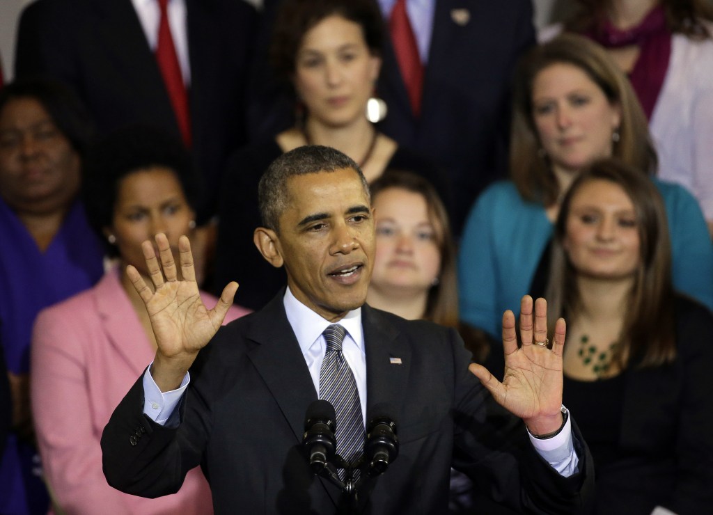 President Barack Obama speaks at Boston’s historic Faneuil Hall about the federal health care law on Wednesday. Faneuil Hall is where former Massachusetts Republican Gov. Mitt Romney, Obama’s rival in the 2012 presidential election, signed the state’s landmark health care law in 2006, with top Democrats standing by his side.