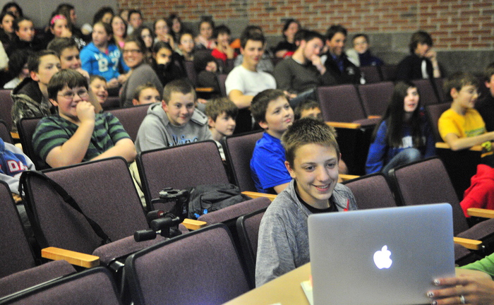 Jett Boyer smiles as Sen. Angus King, I-Maine, answers his question about who he’d be cheering for in the World Series today, at Hall-Dale High School in Farmingdale. King replied that it would be the Red Sox.