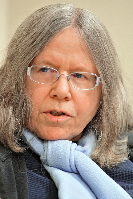 Nancy Bryant, of Whitefield, talks about the Kennedy assassination during a class on Friday at the University of Maine at Augusta.