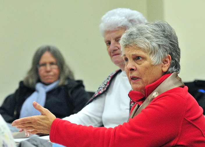 Barbara McCarthy, of Gardiner, right, talks about the Kennedy assassination during a class on Friday at the University of Maine at Augusta.