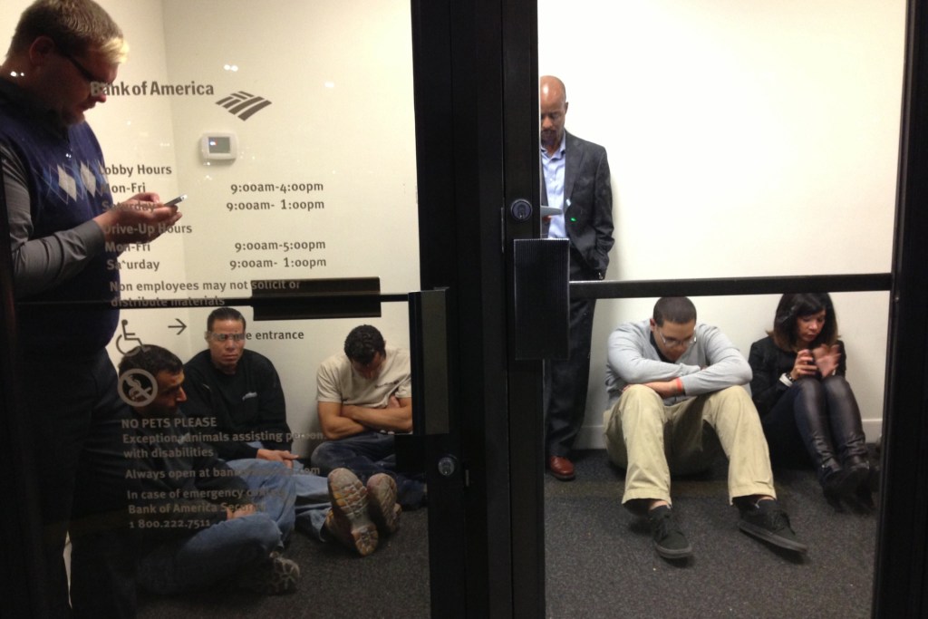 People camp at Bank of America at the Garden State Plaza on Monday during a lockdown of the Garden State Mall.