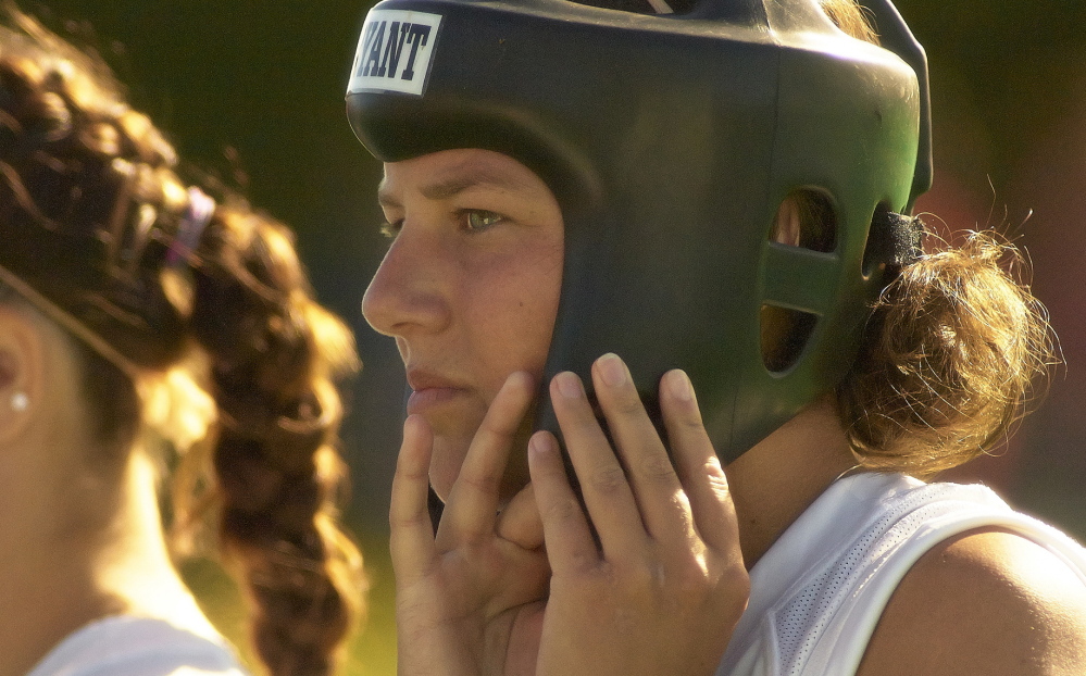 Kayleigh Ballantyne, of Gorham, plays field hockey for Bryant College at a game with UMaine in Orono on Oct. 6, a few months after she was stabbed by an assailant outside her South Boston apartment. “He tried to take my life,” she says.