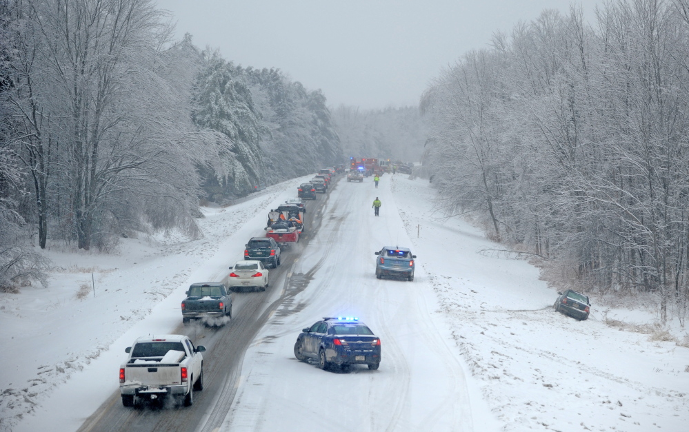 Staff photo by Michael G. Seamans STORMY TRAVEL: A multi-vehicle accident snarled traffic on the northbound lanes on Interstate-95 on the Sidney and Waterville on Thursday, Dec. 26, 2013. Snow has complicated matters in central Maine with residents still dealing with the ice storm that paralyzed much of central Maine this week.