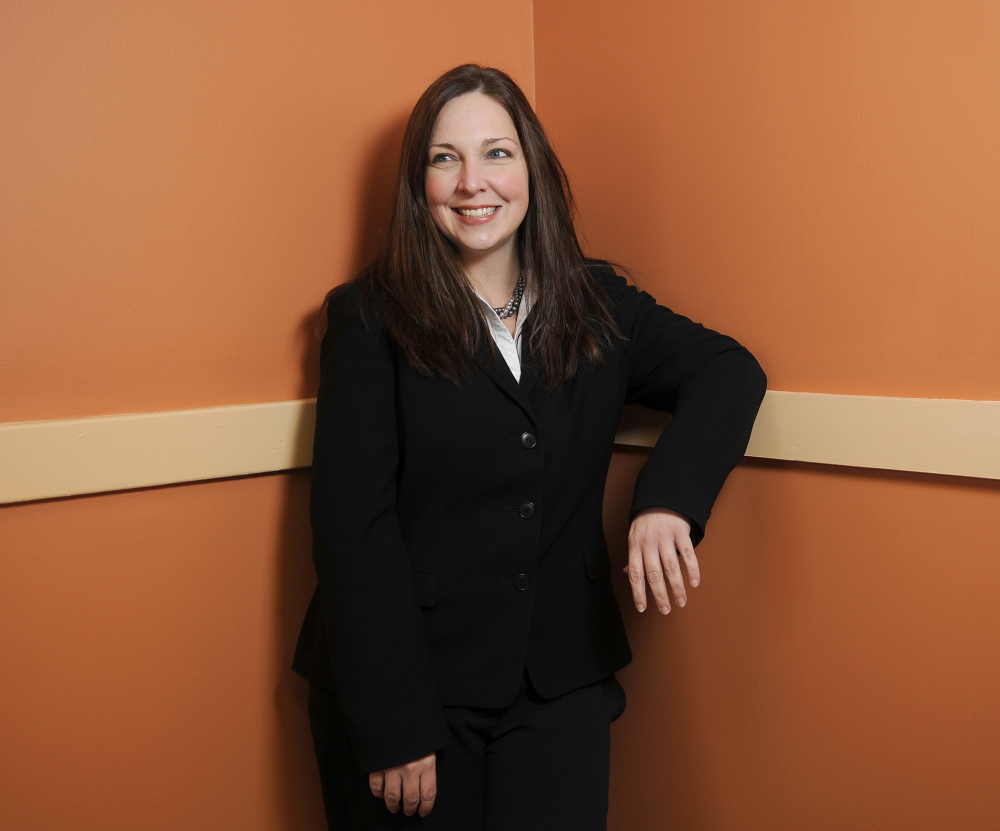 YOUNG PRO: Amanda Bartlett, the new director of the Augusta Housing Authority and winner of the Chamber of Commerce’s Young Professional Award, at her Augusta office.