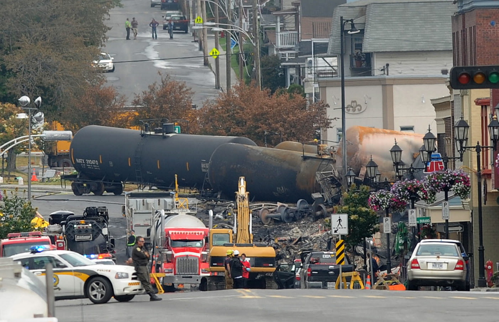 Railway Explosion: Crude oil tankers from the Montreal, Maine & Atlantic railways are seen in the heart of Lac-Megantic, Quebec, where the runaway train exploded killing 47 in July.