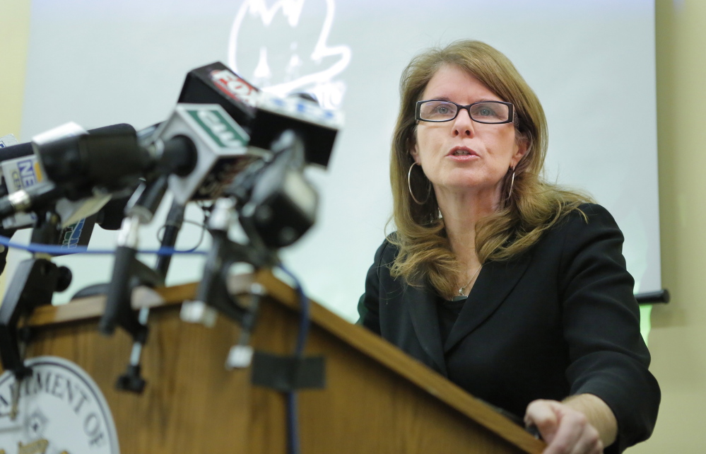 Mary Mayhew, commissioner of the Department of Health and Human Services, discusses findings of a report done by the Alexander Group about the cost of expanding MaineCare while talking to reporters at the Department of Health and Human Services in Augusta on Friday, January 10, 2014.