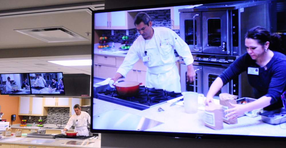 Staff photo by Joe Phelan Chef Conrad Olin, left, and registered dietitian Shelly Goraj put on a cooking demonstration on Wednesday January 29, 2014 in the The Prescott Education Pavilion in the MaineGeneral Medical Center in Augusta.