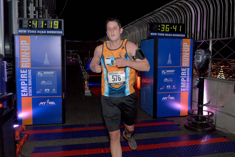 Contributed photoSTAIR MASTER: Nate Poulin runs in last year’s Empire State Building Run-Up, the annual climb up the Empire State Building’s 1,576 steps. Poulin will be running it again Wednesday to raise money for the Multiple Myeloma Research Foundation, after his father, Michael Poulin of Winslow, was diagnosed with the incurable cancer.