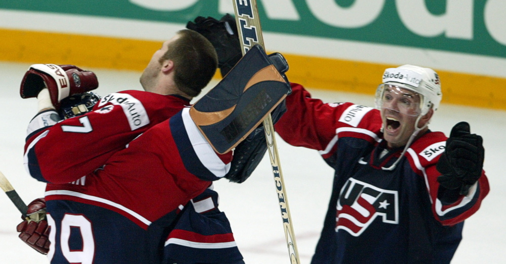 Eric Weinrich, right, who has deep ties to Maine, was the first University of Maine hockey player to make the U.S. Olympic team, in 1988.