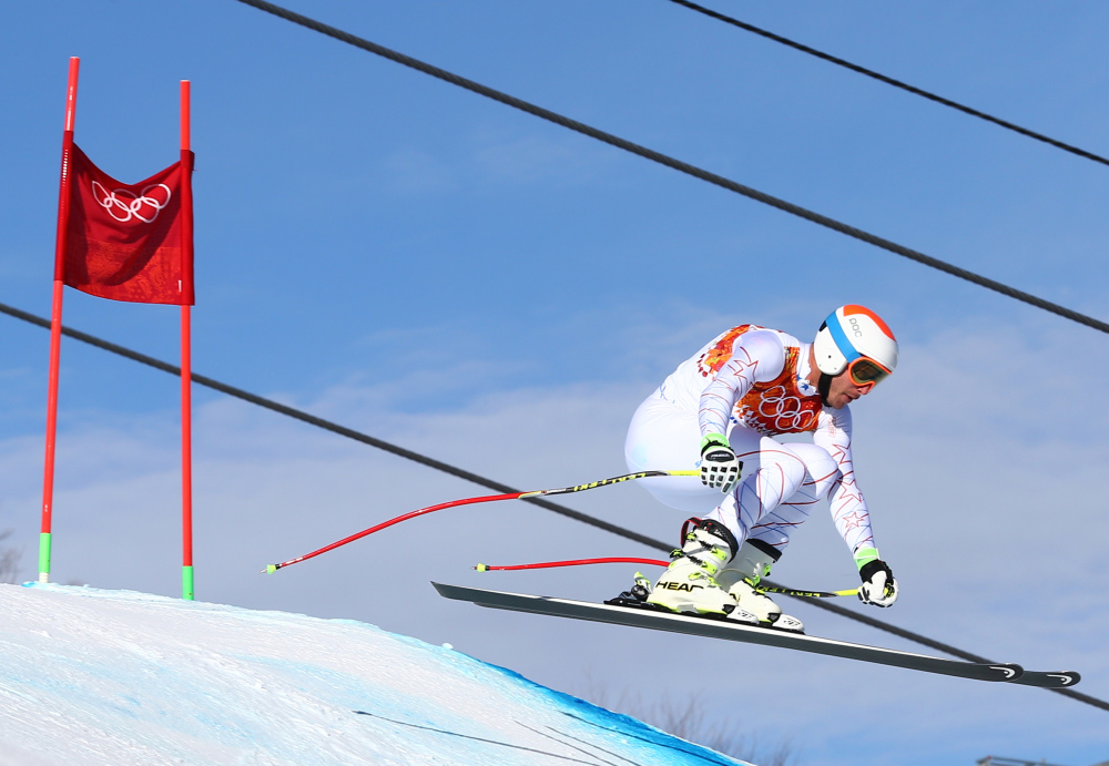 United States’ Bode Miller jumps during a men’s downhill training run for the Sochi 2014 Winter Olympics on Saturday in Krasnaya Polyana, Russia.