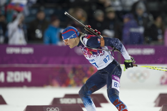 Maine’s Russell Currier competes Saturday in the 10K biathlon sprint. He finished 61st and missed the cutoff for competing in the pursuit race by just three seconds.