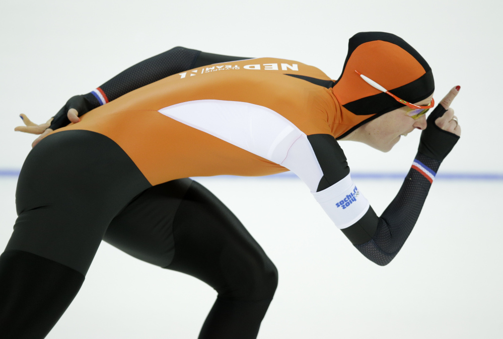 Ireen Wust of the Netherlands competes in the women’s 3,000-meter speedskating race at the Adler Arena Skating Center during the 2014 Winter Olympics, Sunday in Sochi, Russia. Wust won the gold.