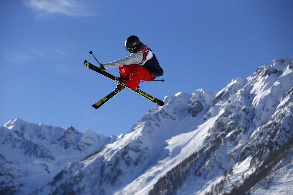 Joss Christensen of the United States competes in the men’s ski slopestyle qualifying at the Rosa Khutor Extreme Park. Christensen’s three off-axis jumps at the end of his first qualifying run totaled 10 full spins in the span of 15 seconds — all coming while he skied over the ramp backward.