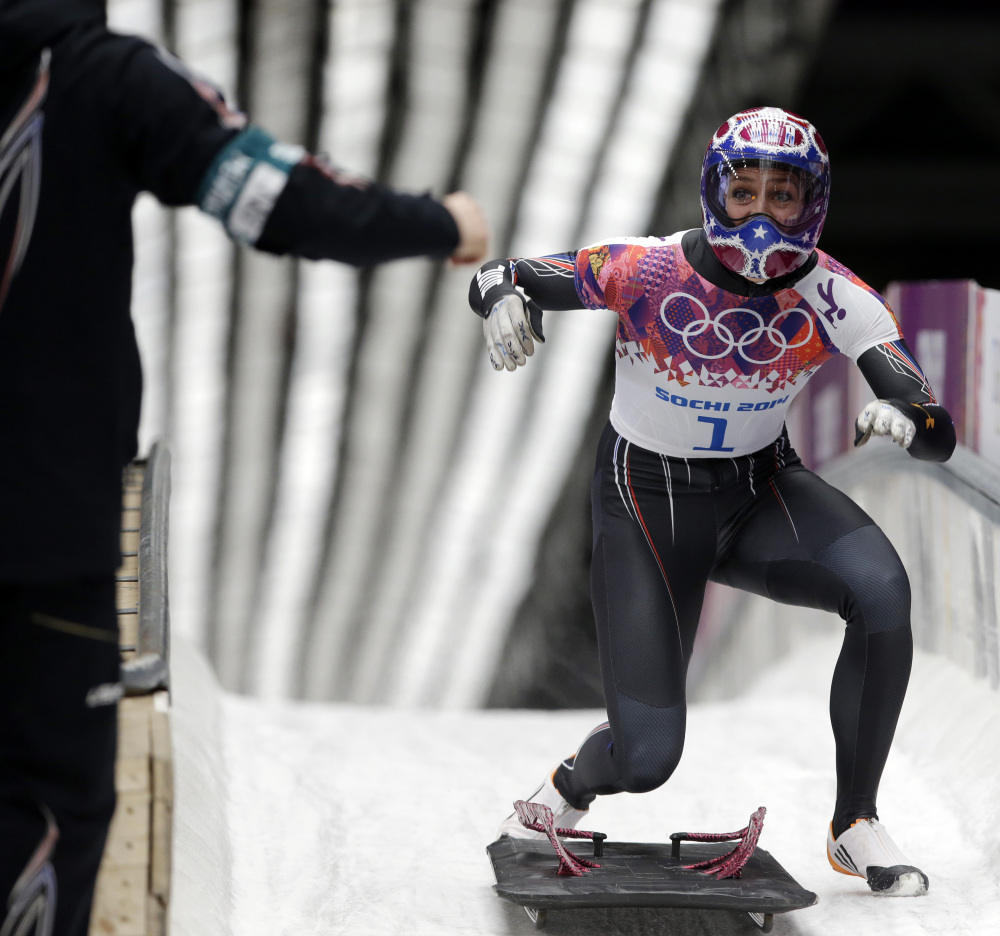 Noelle Pikus-Pace of the United States celebrates her silver medal win in the finish area.