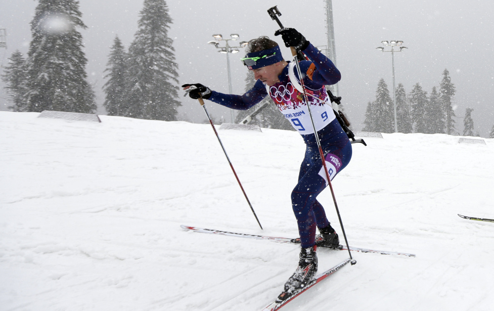 Norway’s Emil Hegle Svendsen competes to win the gold medal in the men’s biathlon 15k mass-start, at the 2014 Winter Olympics, Tuesday, Feb. 18, 2014, in Krasnaya Polyana, Russia.