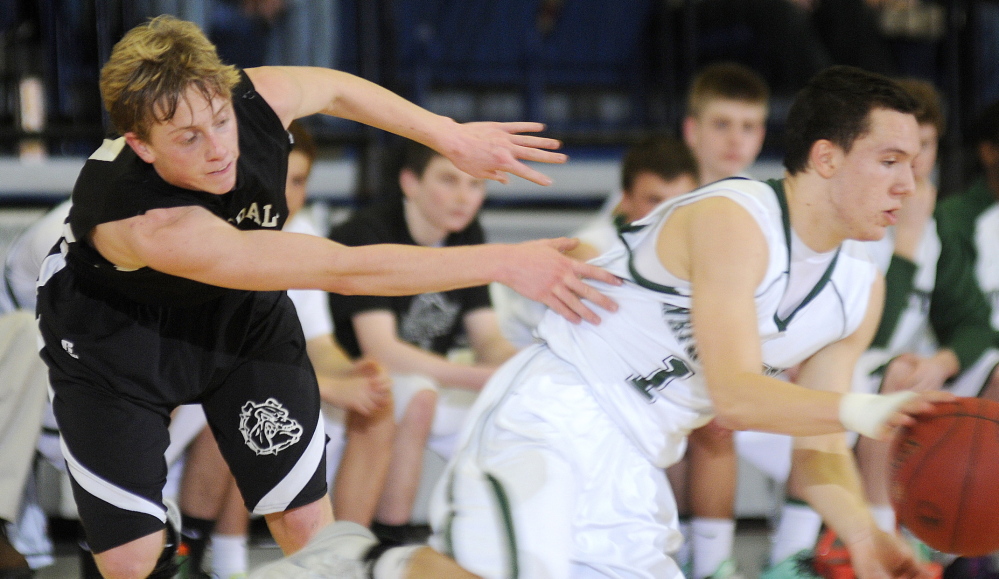 Staff photo by Andy Molloy Hall-Dale High School's Nat Crocker chases Waynflete School's Harry Baker-Connick during a tournament match up Thursday in Augusta.