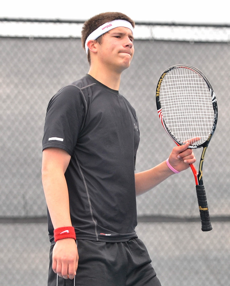Loss: Monmouth Academy’s Kasey Smith reacts after losing a point to a Waterville Senior High School’s Zack Disch at the Round of 48 singles tournament hosted by Colby College in Waterville on Saturday. Disch defeated Smith, 3-6, 6-3, 6-3.