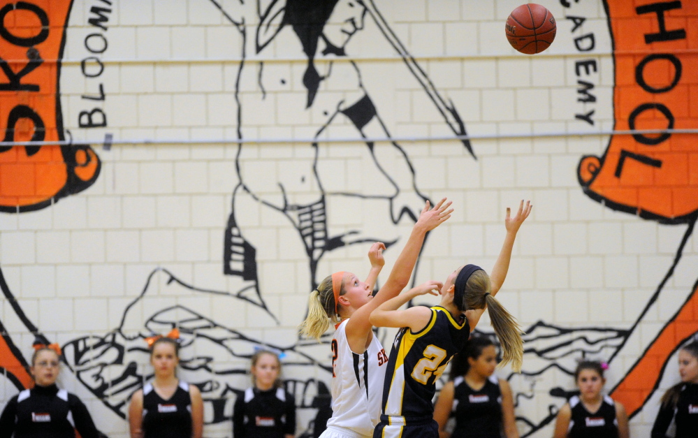 Offensive?: The Skowhegan Area High School Indian mascot is emblazoned on the wall of the gymnasium during a game against Mt. Blue High School in Skowhegan in December 2013.