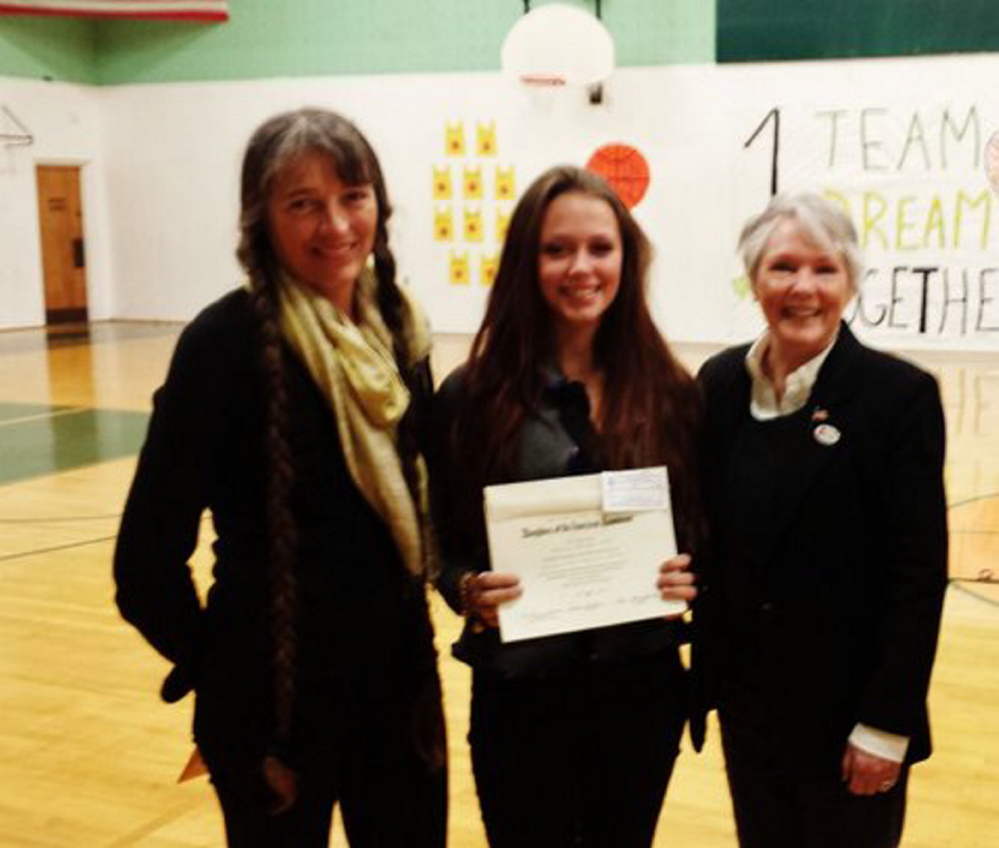 Contributed photo Honored: Heidi Sorensen, left, with her daughter Brianna S. Hall and Laura Donnellan, Colonial Daughters Chapter member.