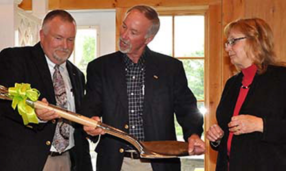 Capital campaign celebration: Mac Cianchette, left, receives ceremonial shovel from Mike Gallagher, center, and Terri Vieira at Capital Campaign Finale event in Palmyra