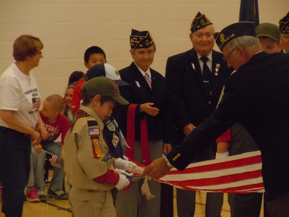 Students at Carrie Ricker School participate in a Flag Day Ceremony.