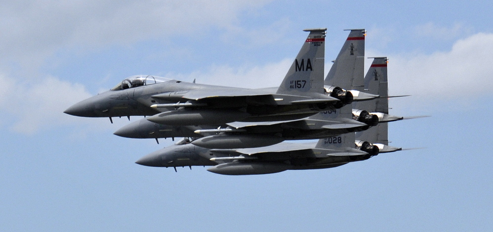 Lt. Col. Eric Samuelson, 46, made a final flight in a high-performance F-15, buzzing the Portland International Jetport, where members of the congregation where he is pastor gathered to cheer for him Thursday. He was flying with two other F-15s.