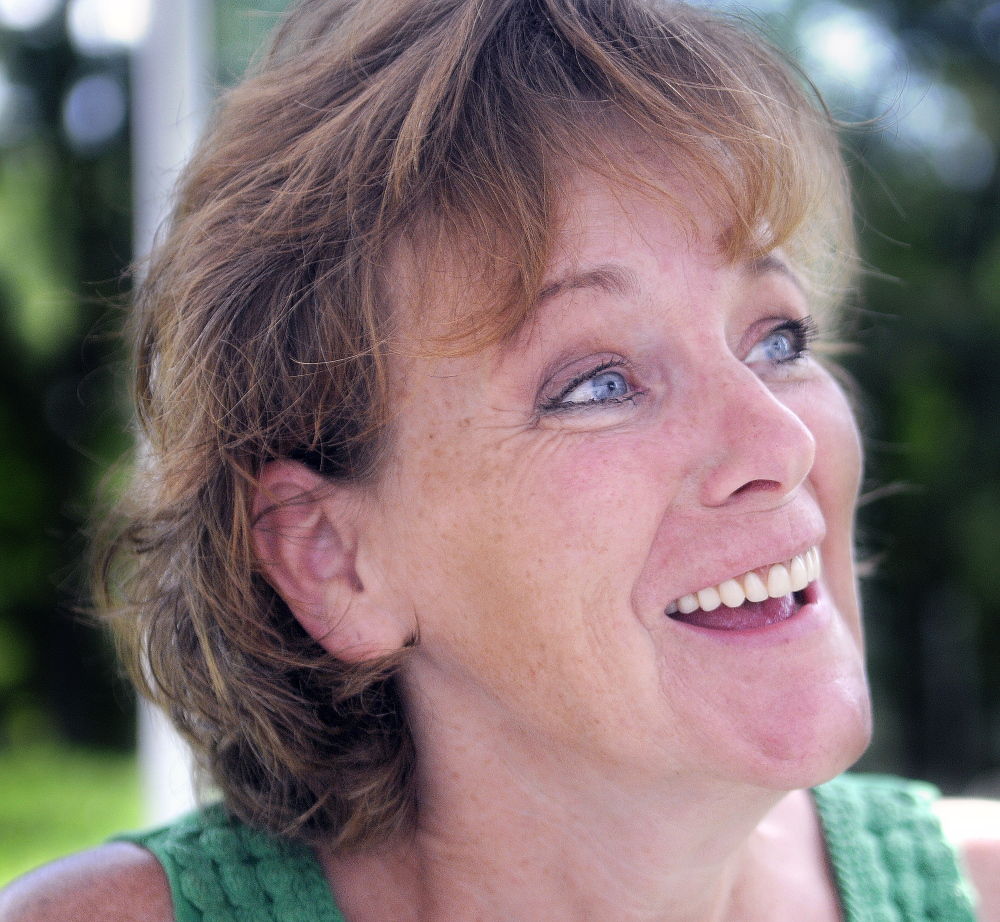 Jackie Foster greets guests Sunday, July 27, 2014, at Butting Heads Farm in Gardiner during Open Farm Day.