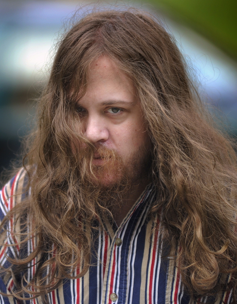 AUGUSTA, ME - AUGUST: Eric Bard of Sidney is escorted Tuesday August 26, 2014 into Kennebec County Superior Court in Augusta to stand trail sexually abusing young girl he was babysitting and recording it. (Photo by Andy Molloy/Staff Photographer)