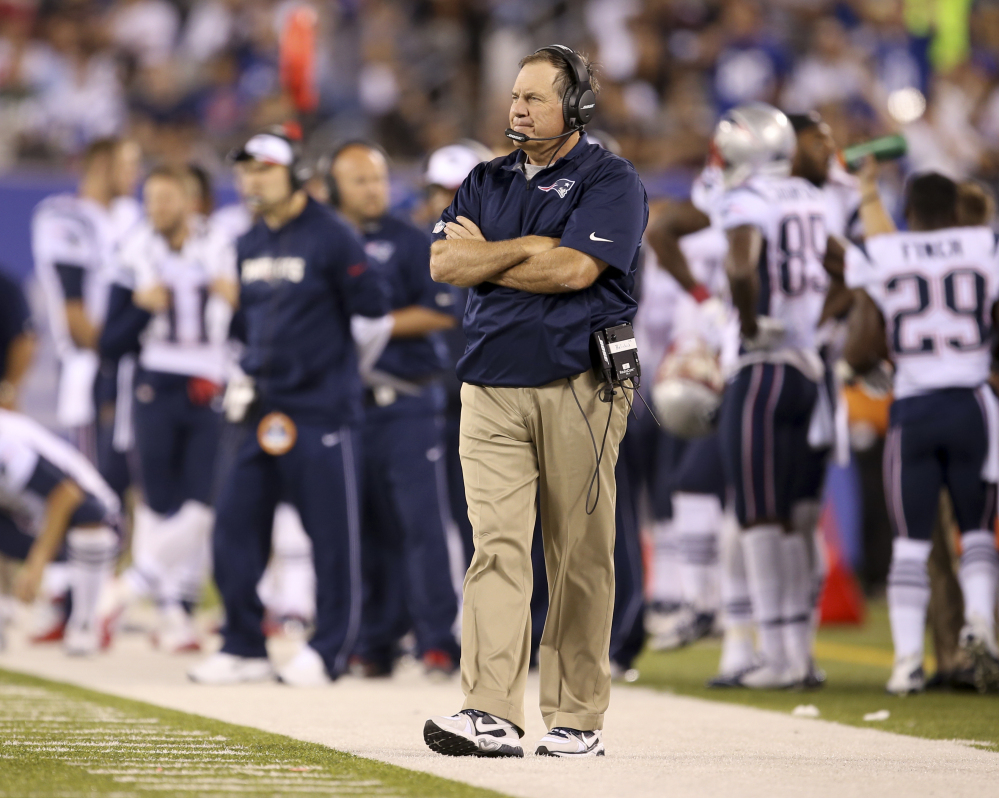 New England Patriots head coach Bill Belichick looks on from the sidelines during the second half of an NFL preseason football game against the New York Giants, Thursday in East Rutherford, N.J.