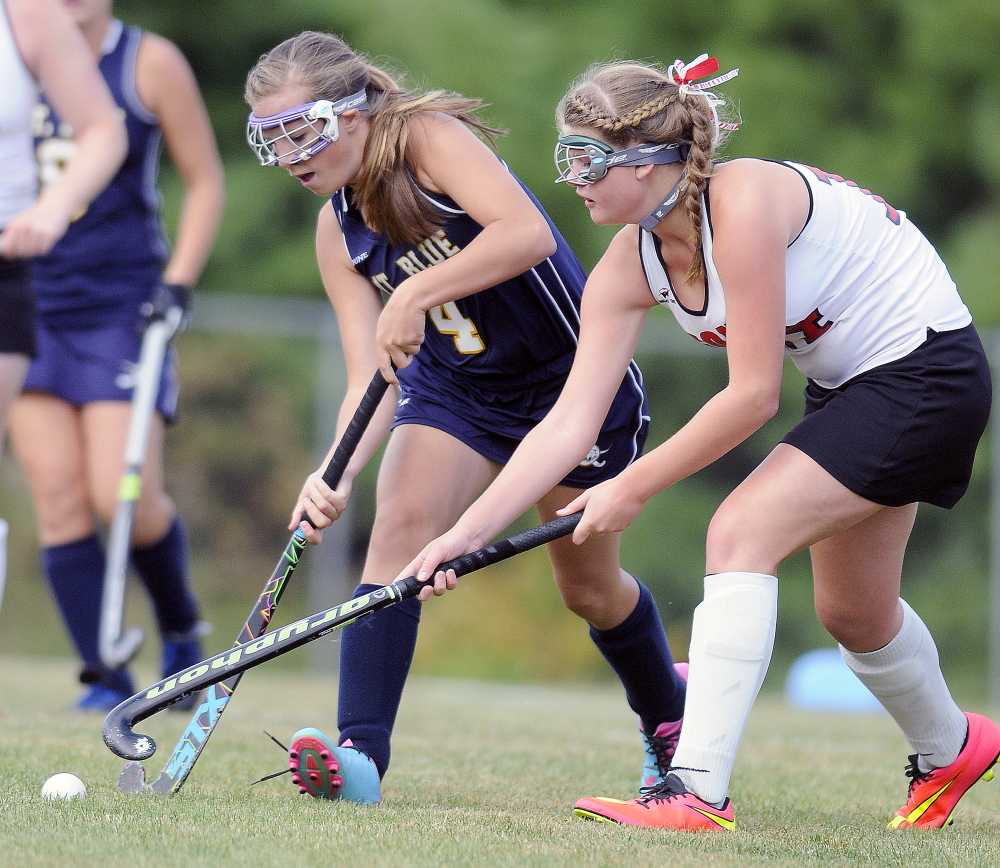 Staff photo by Andy Molloy 
 Cony High School's Julia Sternard, right, chases Mt. Blue's Jordyn Lawrence during a Kennebec Valley Athletic Conference Class A game Tuesday afternoon.