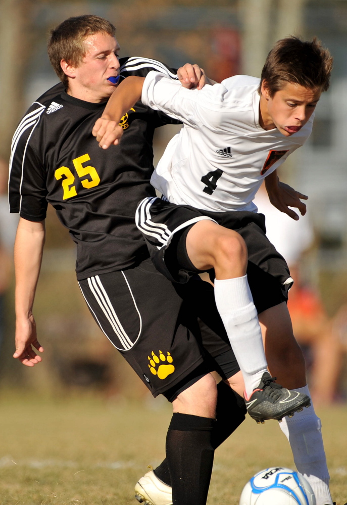 Staff file photo by Michael G. Seamans
Maranacook High School’s Matt DuBois (25) spent a year living with family in Minnesota. But since his return left. and a position change, DuBois is having a successful season, while the Black Bears have a shot at back-to-back Class C championships.